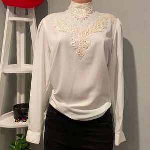 Off White Blouse with lace detail.